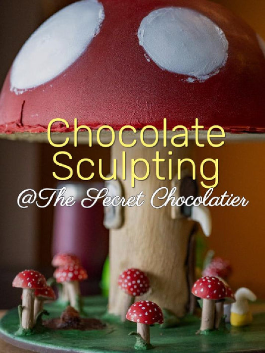 Chocolate Sculpting at The Secret Chocolatier, image shows a red and white toadstool made of chocolate