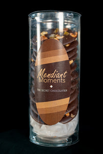 Mendiant moments, dark chocolate disks with orange peel and pecans