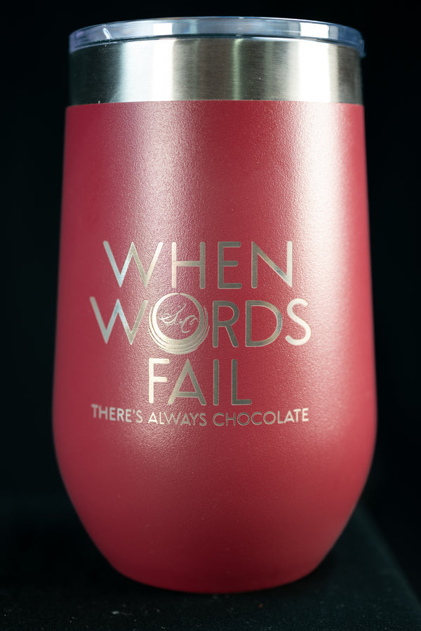 Pink stainless steel insulated tumbler engraved 'When Words Fail There's Always Chocolate' with The Secret Chocolatier monogram.