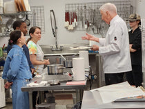 Chef Bill Dietz instructing participants during a hands-on chocolate truffle-making workshop at The Secret Chocolatier in Charlotte, NC.