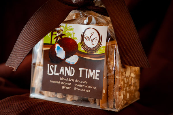 Close-up of Island Time Bark showing the nut and coconut pieces against the chocolate.