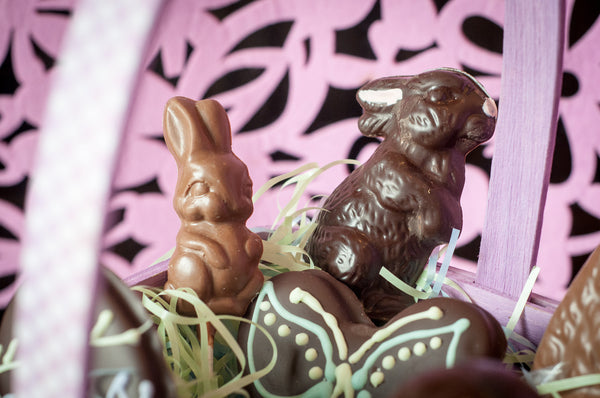 Milk chocolate and dark chocolate Easter bunnies in the Large Chocolate Easter Basket with the piped chocolate butterfly in front.