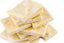 Stack of White Chocolate Toasted Macadamia Bark squares with macadamia nut pieces visible throughout the white chocolate.